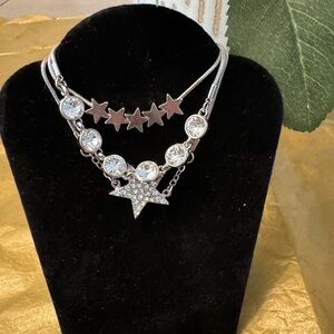 Three bracelets in one with CZ’s. NWT